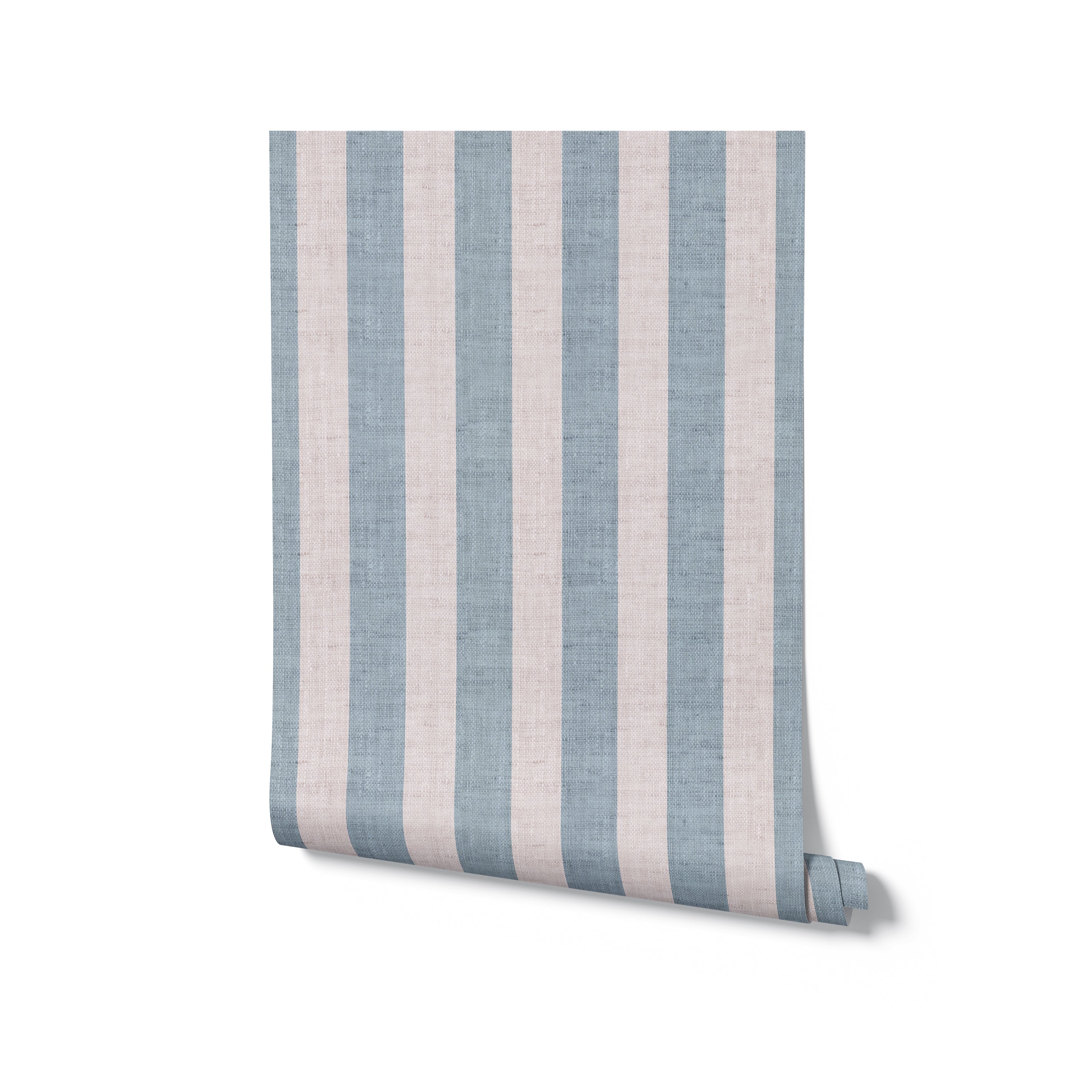 Rolled up view of Ticking Fabrics 7 II Wallpaper displaying wide vertical stripes in muted blue and cream. The visible texture mimics a fine linen material, ideal for adding a touch of understated elegance to any room