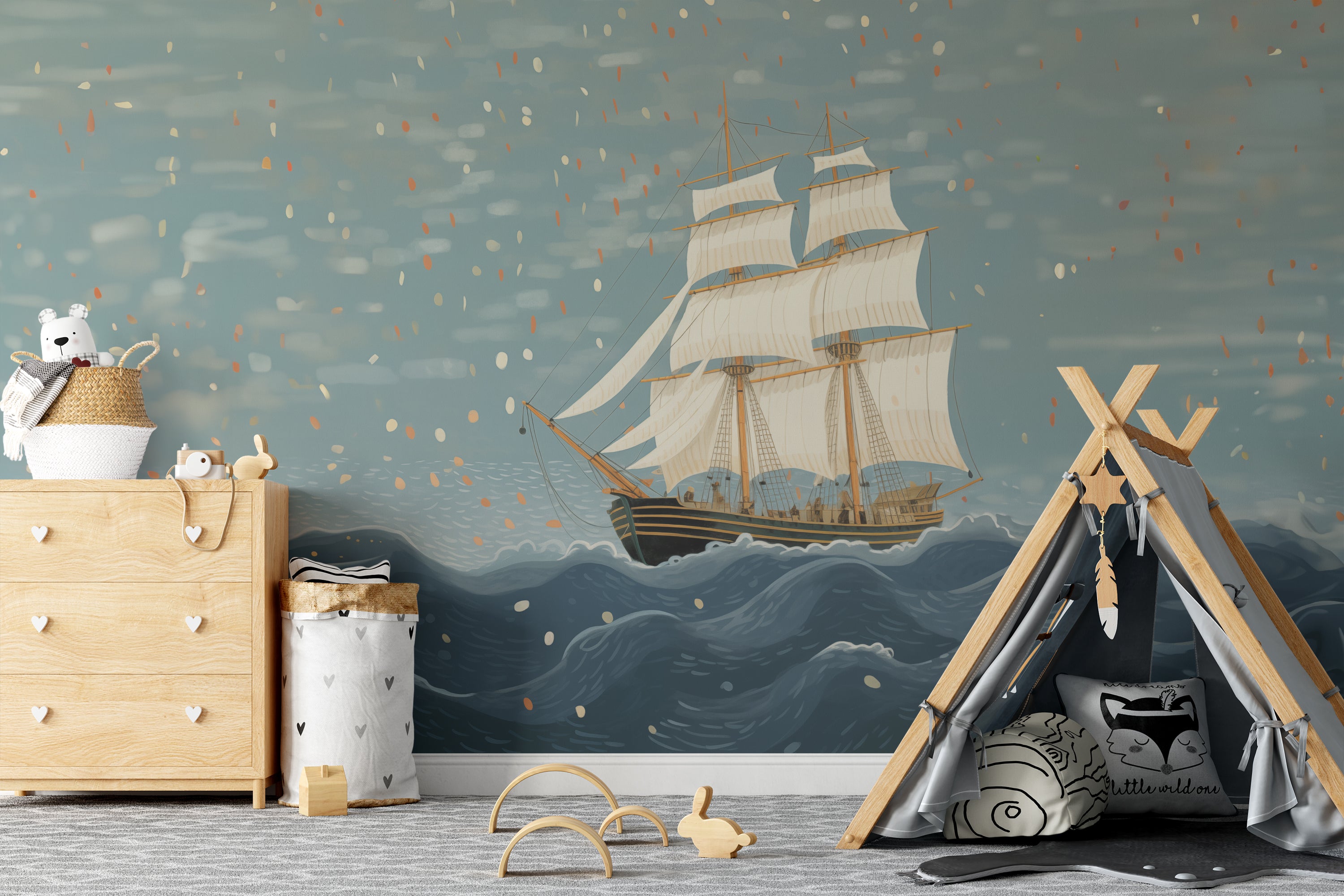 Child's bedroom with nautical theme featuring a ship sailing mural on the wall, a tent play area, and wooden toys.