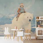 Dreamy child's playroom with wall mural of a young explorer on a polar bear from 'The Golden Compass Mural.