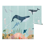 Wall-sized Deep Sea Wallpaper Mural in panels, featuring an expansive underwater world with whales, fish, and coral, ideal for adding a captivating oceanic atmosphere to any room.