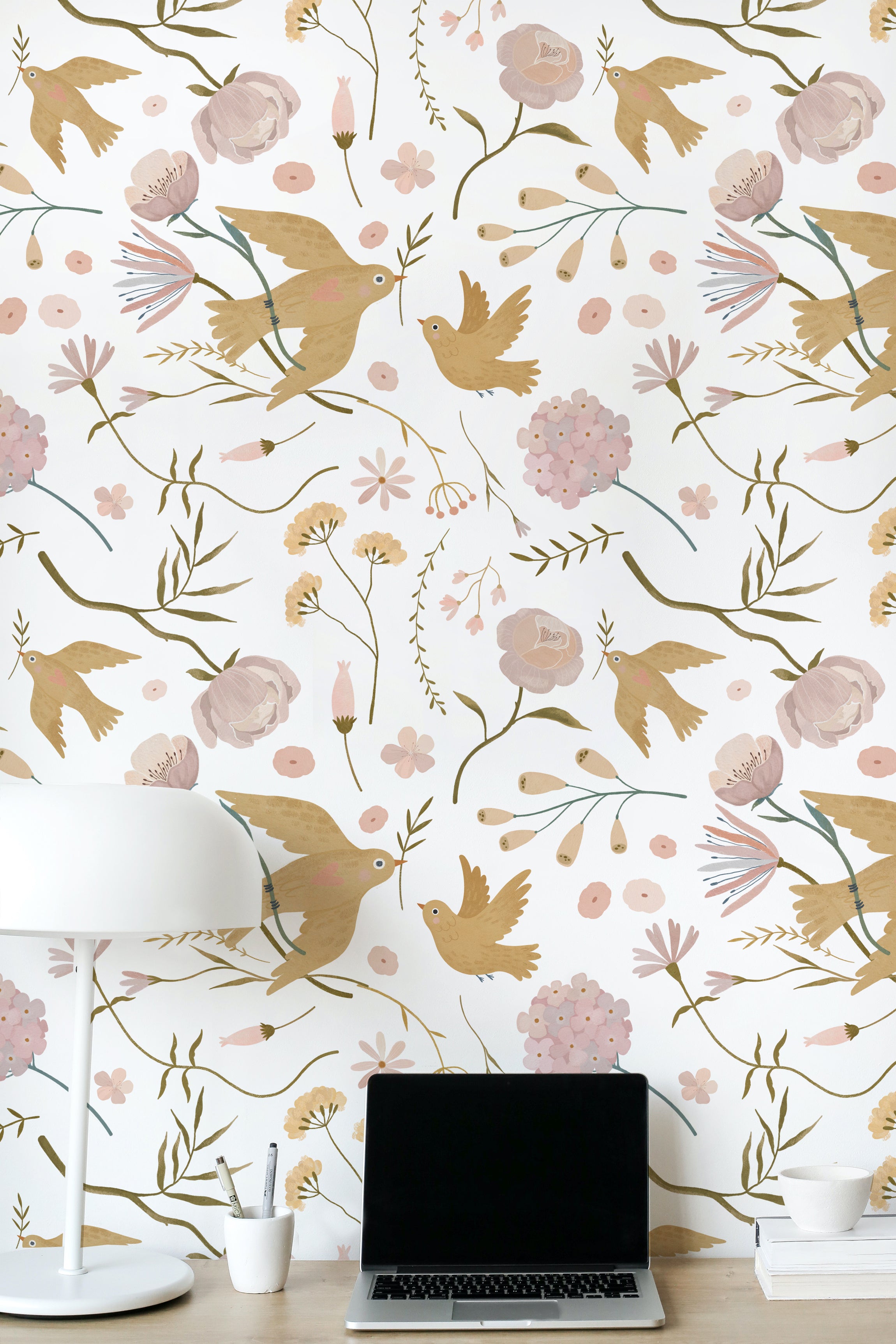 A home office space enhanced by the Pastel Garden Wallpaper, featuring charming illustrations of birds and botanicals in soft pastel tones. The floral and avian elements create a lively yet serene work environment.