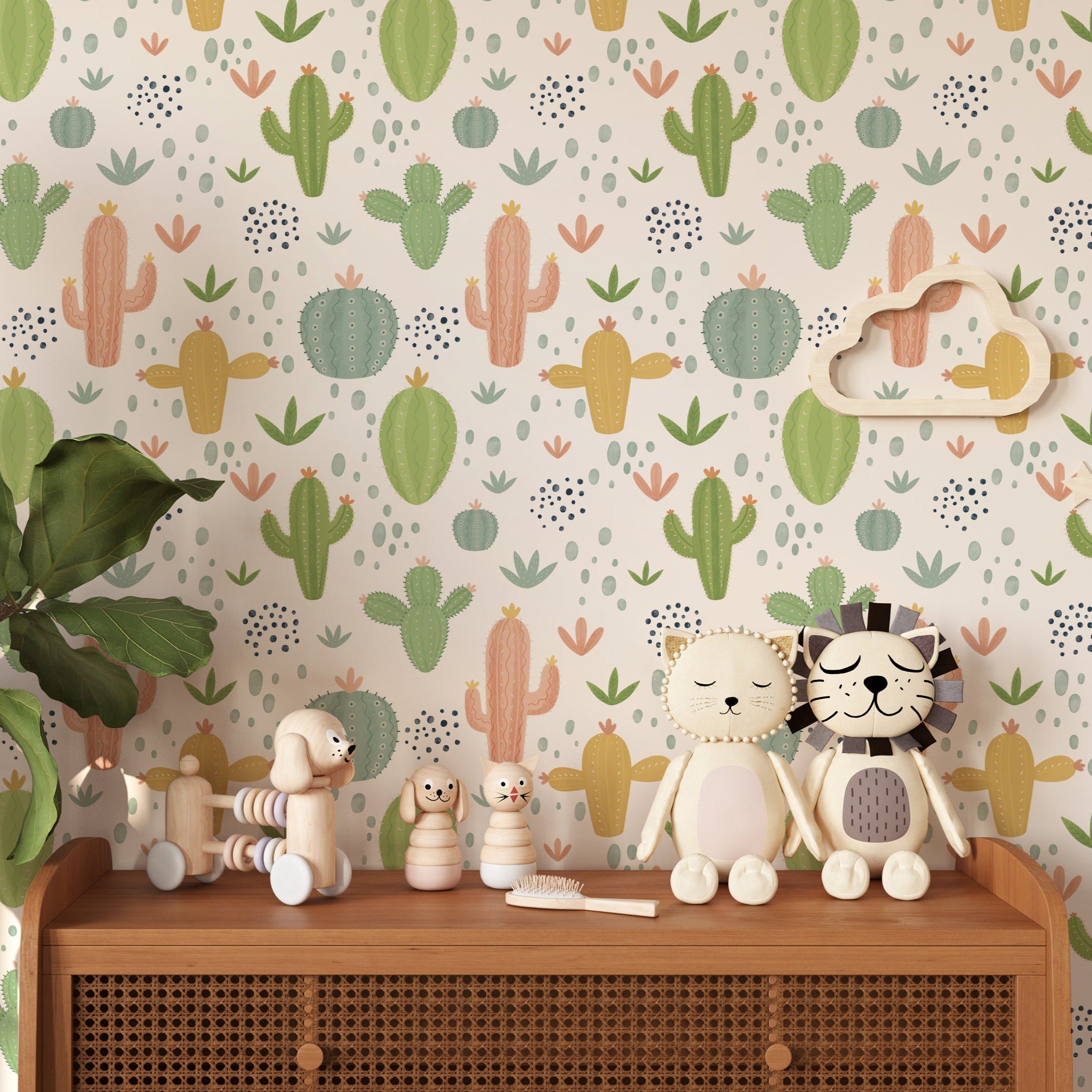 A vibrant children's room featuring walls adorned with 'Colourful Cactus Kids Wallpaper,' displaying various cacti in green and pastel hues alongside small orange and yellow flowers, complementing the playful and natural theme of the room