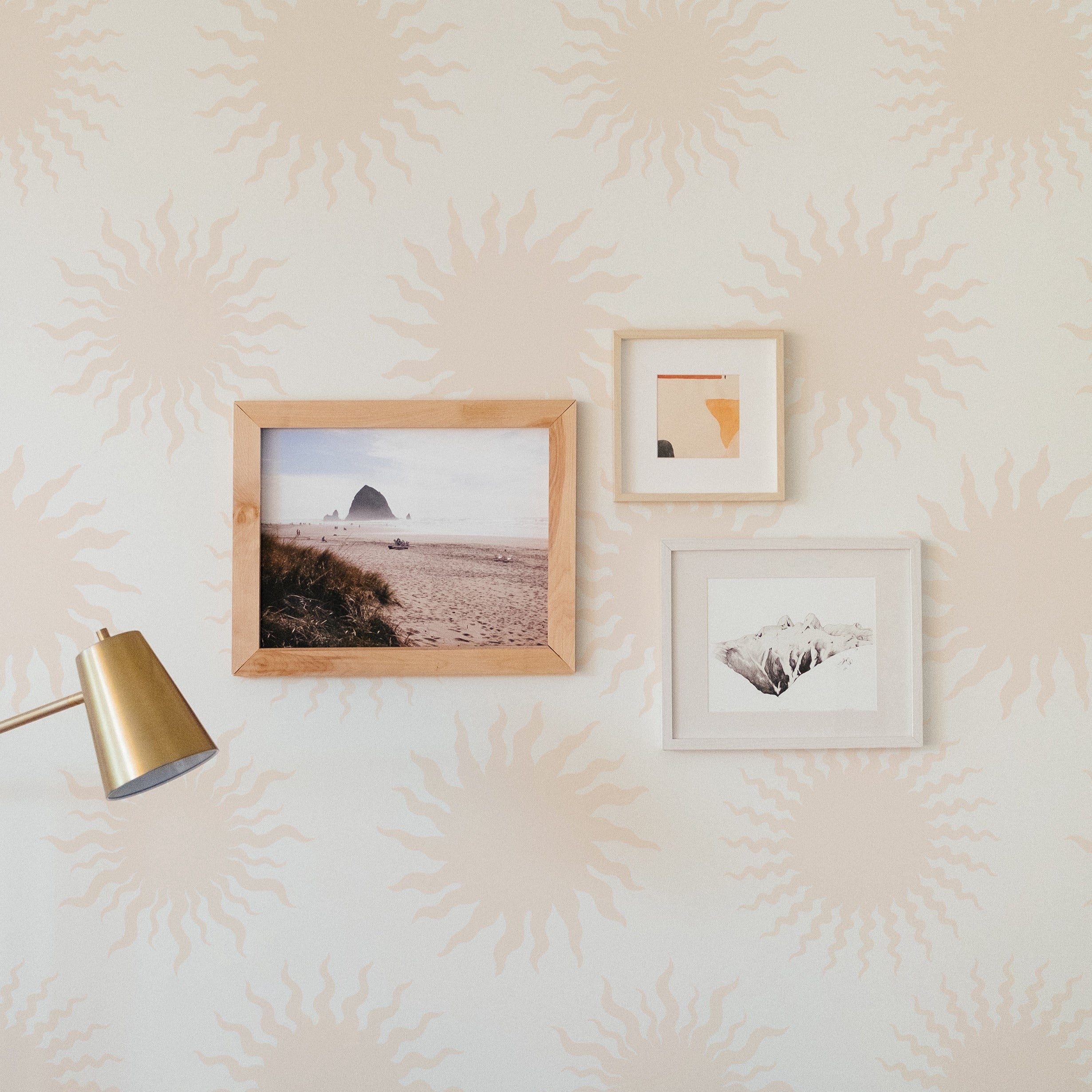 Wall decorated with Sunshine Tropical Dreams Wallpaper featuring subtle sunburst designs.