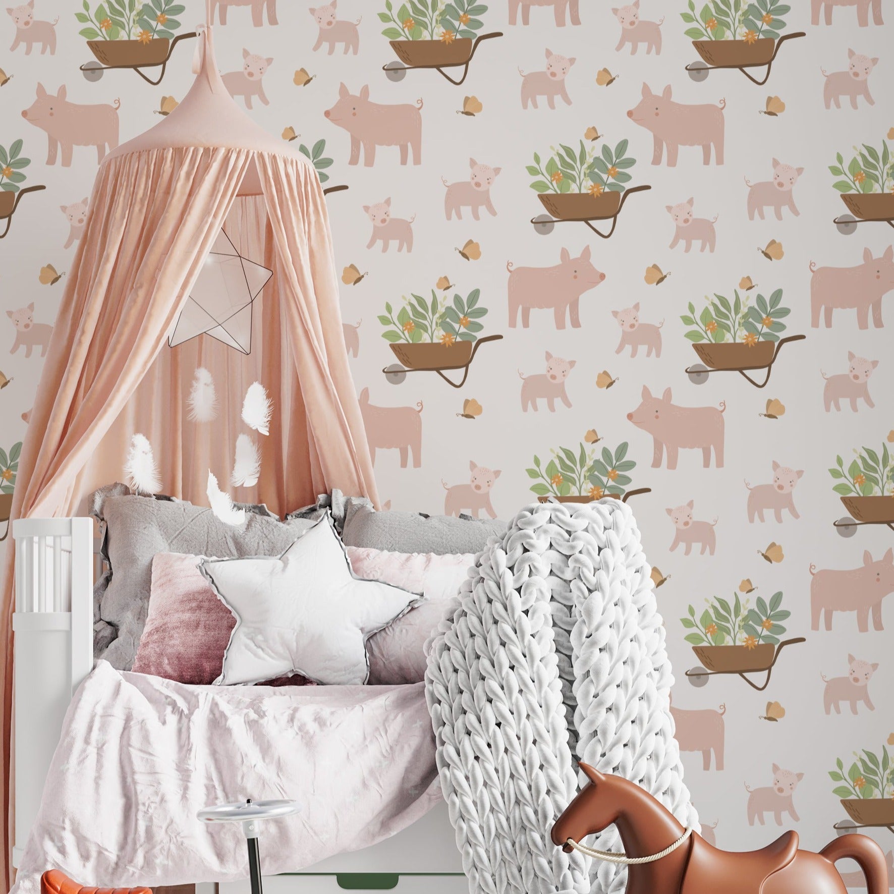 Close-up of Spring Farm Wallpaper in a children's room with pig and wheelbarrow designs.