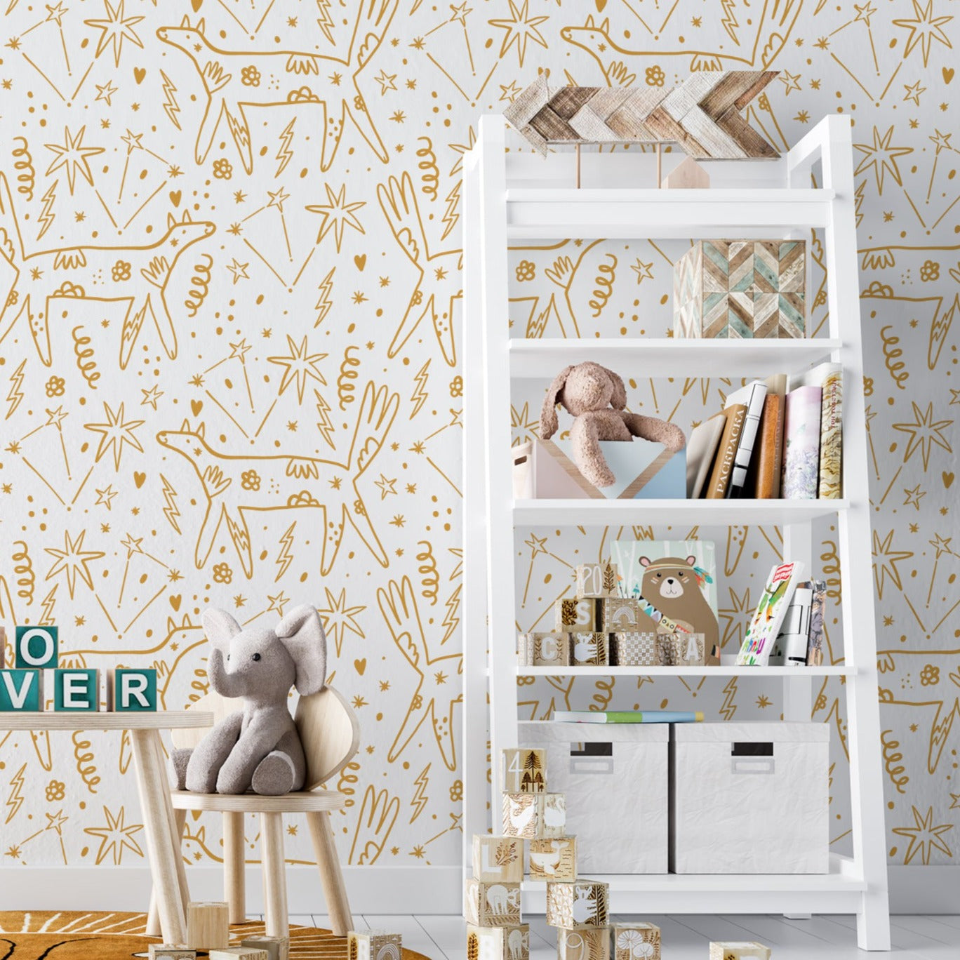 A cozy corner of a child's room enhanced by 'Dog Wallpaper 34,' which showcases golden abstract dog designs and stars on a white background, adding a magical and imaginative feel to the space.