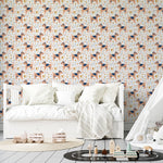Children's bedroom showcasing 'Dog Wallpaper 38' with peach dogs, stars, and floral designs enhancing the wall. The room is styled with soft bedding and a child-friendly play tent, creating an inviting and whimsical environment for rest and play