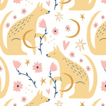 Enchanting wallpaper pattern from 'Dog Wallpaper 41' featuring golden dogs in serene poses surrounded by whimsical celestial motifs, pink flowers, and delicate branches on a light background. This design is perfect for adding a touch of magic and tranquility to any room, especially suitable for children's rooms or peaceful retreats