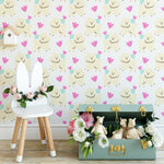 A cozy children's play area decorated with 'Dog Wallpaper 39,' showcasing fluffy cream dogs, pink hearts, and teal flowers on the walls. The setting includes stylish kids' furniture and decorative toys, enhancing the playful and inviting atmosphere.