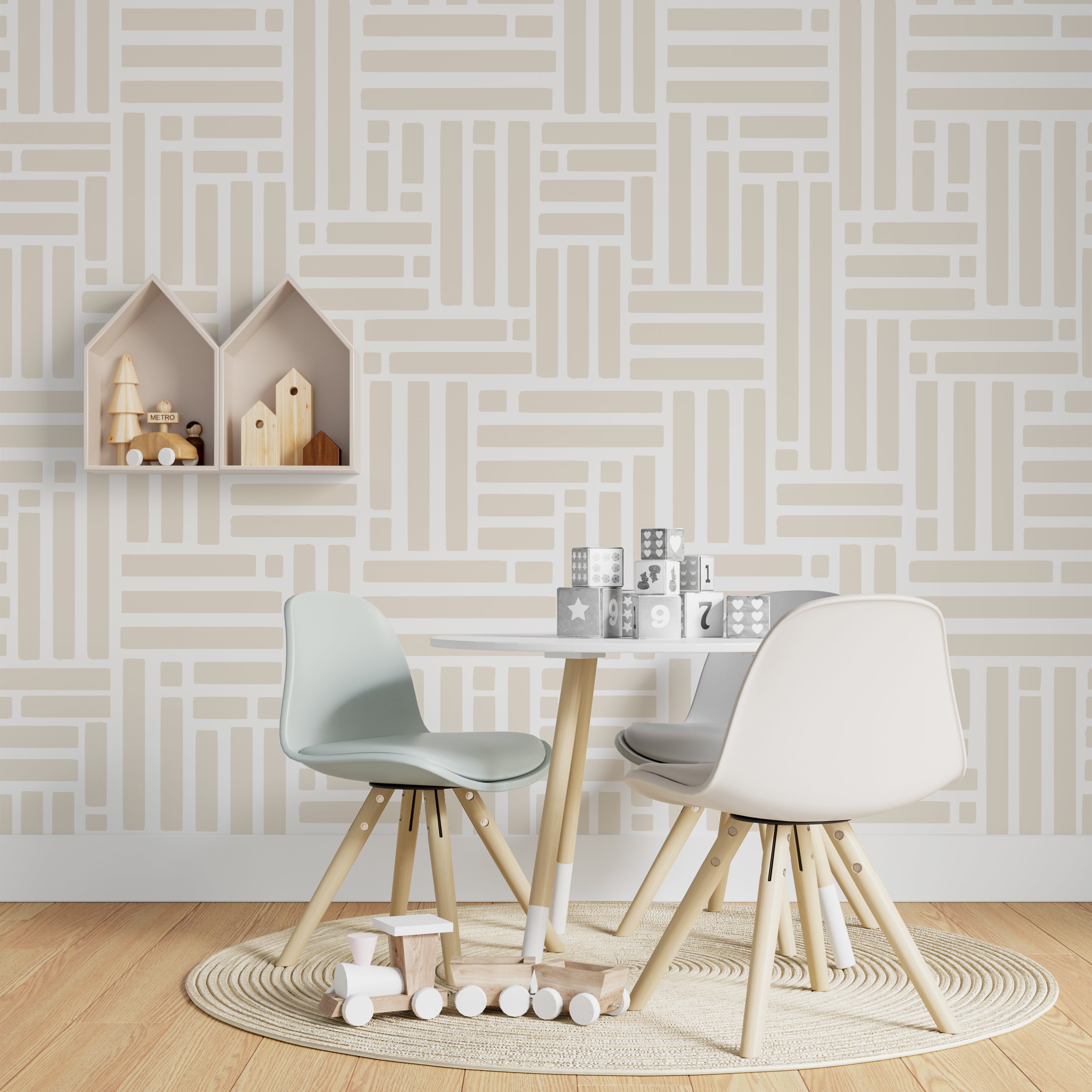 A contemporary children's play area with walls adorned with Organic Wallpaper 22, displaying a beige geometric pattern. The area is equipped with a small table and chairs, wooden toys, and educational blocks, ideal for a creative and engaging space.