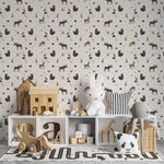 Children's room adorned with Deer and Bear Wallpaper, creating a lively and engaging atmosphere. The wallpaper features charming illustrations of deer and bears surrounded by nature, complementing a room filled with toys and child-friendly furniture