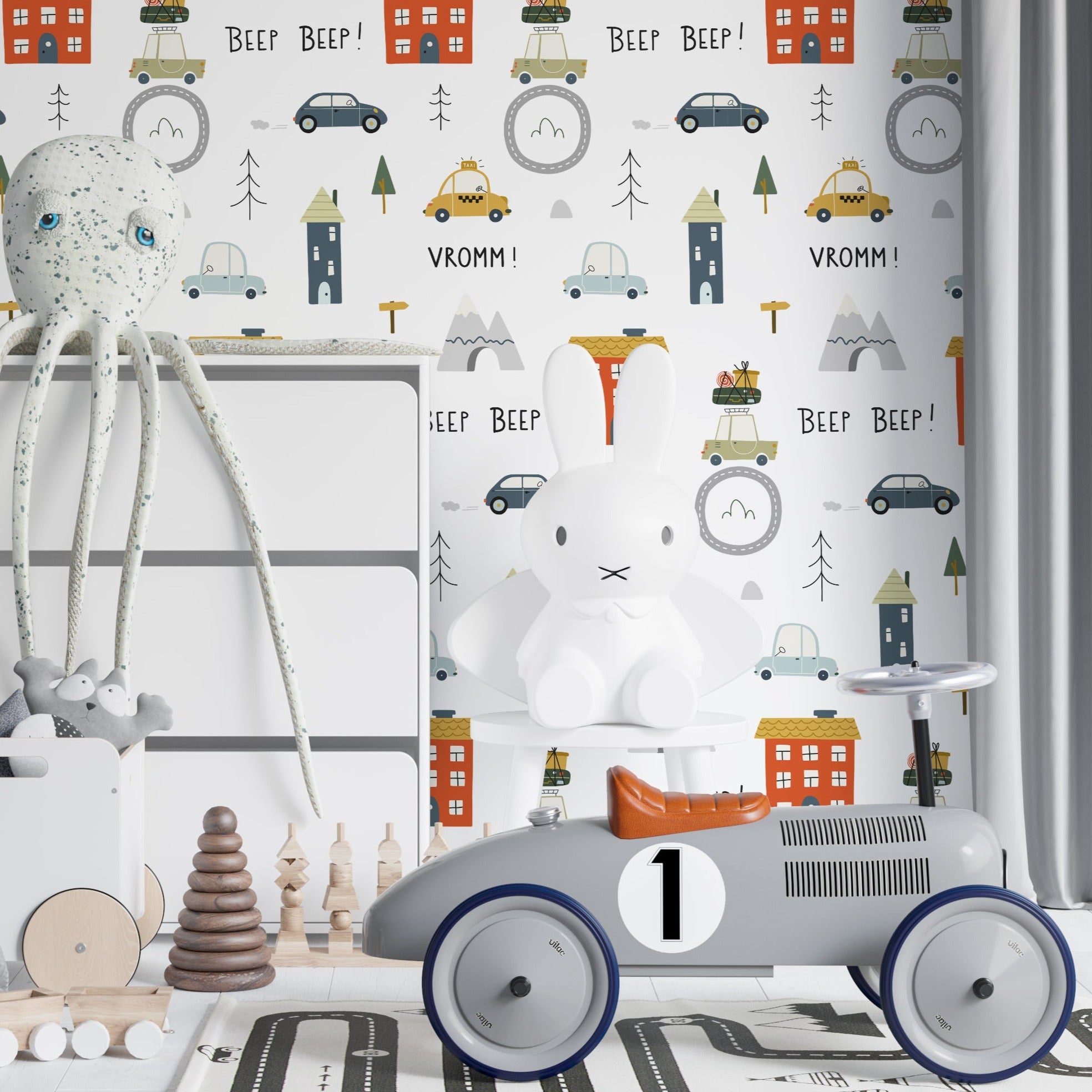 Children's nursery room adorned with Cute Cars Wallpaper 04, displaying a colorful and playful scene of animated vehicles driven by animals. The room setup includes a white crib surrounded by stuffed animals and toys, creating a lively and inviting atmosphere