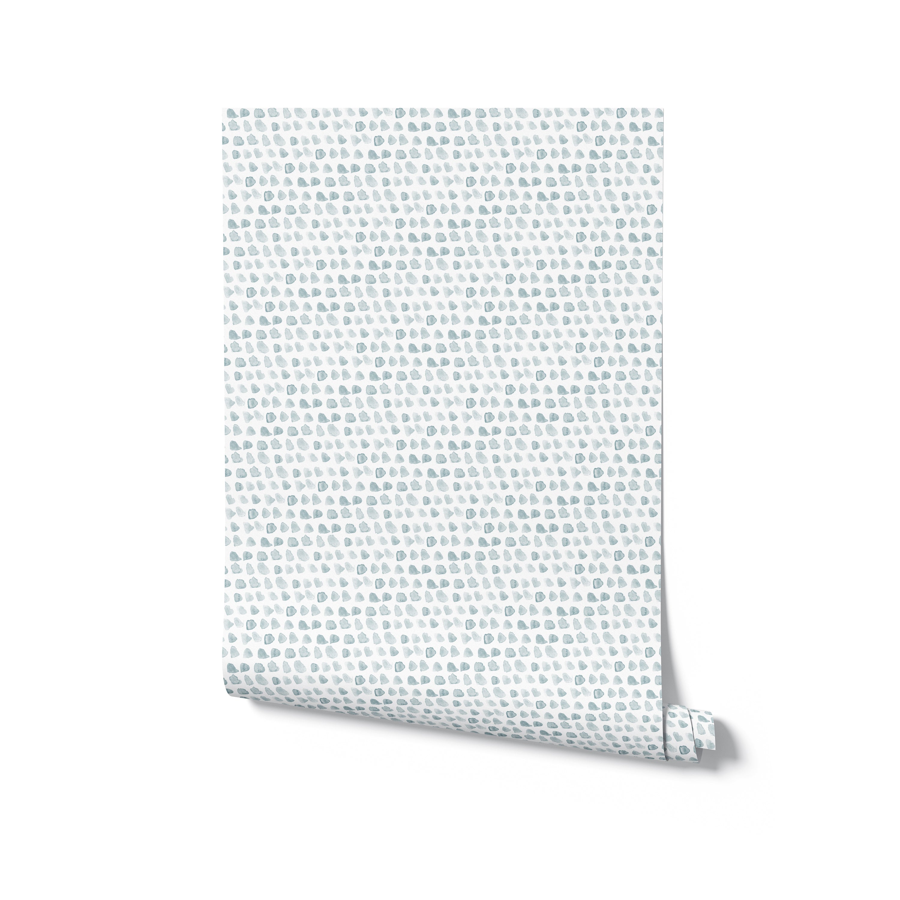 A realistic mockup of the Handpainted Dots Wallpaper rolled up and standing against a white background. The wallpaper features a delicate pattern of painted dots on a blue smoke surface, illustrating the wallpaper's texture and color as it would appear when applied to a wall.