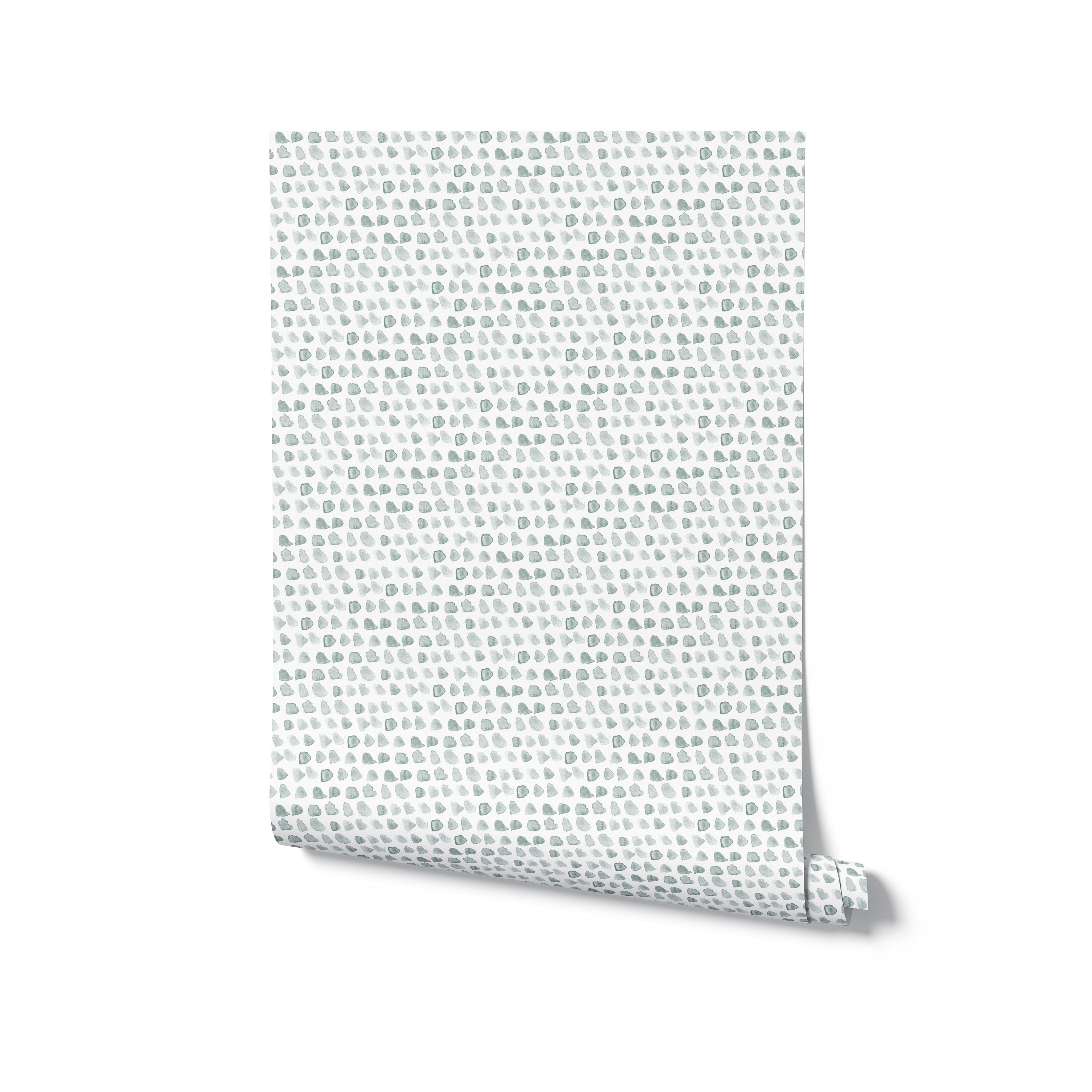 A realistic mockup of the Handpainted Dots Wallpaper rolled up and standing against a white background. The wallpaper features a delicate pattern of painted dots on a sage surface, illustrating the wallpaper's texture and color as it would appear when applied to a wall.