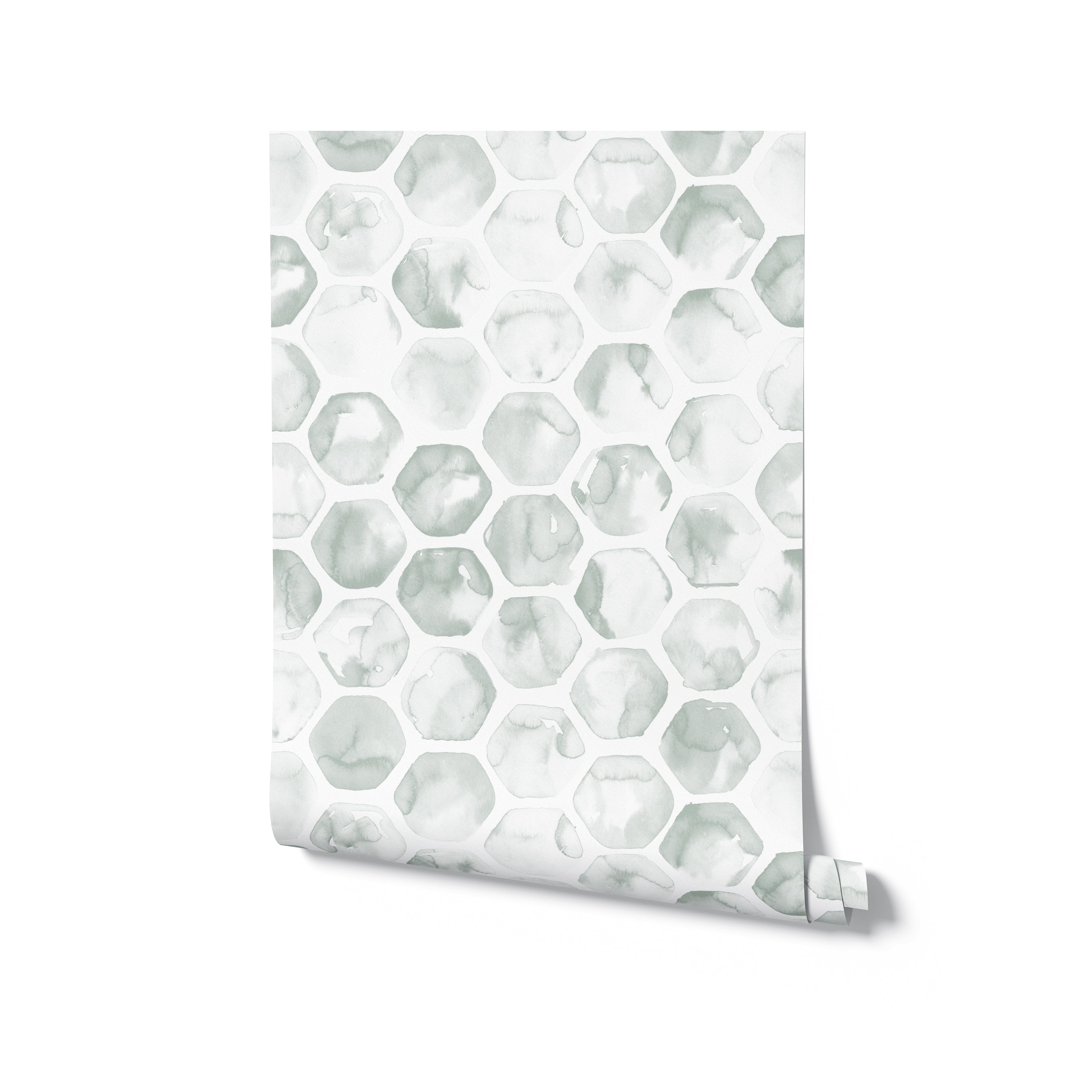"A roll of Watercolour Honeycomb Wallpaper with the design visible on the partially unrolled end, illustrating the pattern's variation in watercolor intensity and shape irregularity, against a pure white background."