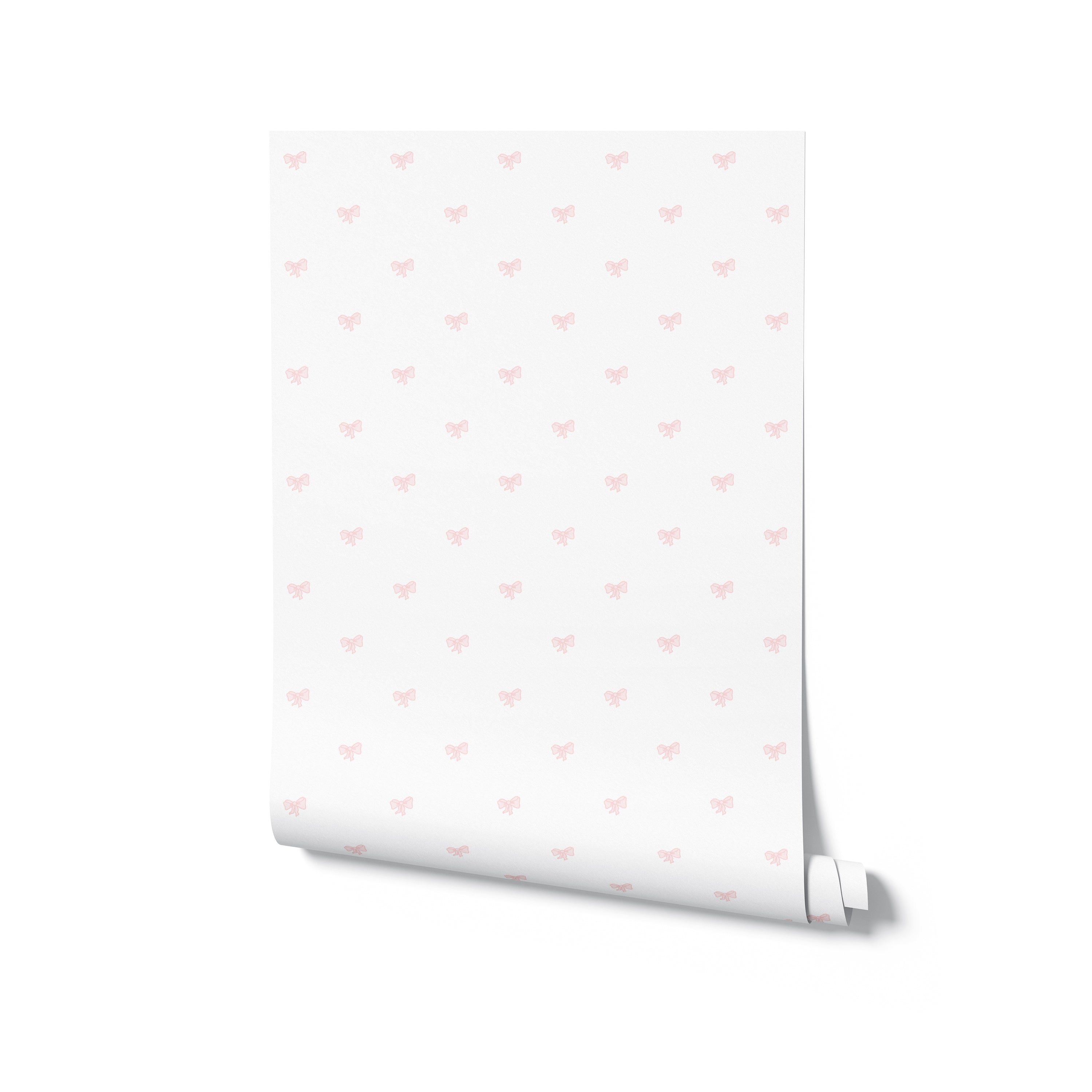 A roll of Tiny Bows Wallpaper illustrating the light cream base adorned with tiny pink bows, perfect for adding a touch of sweetness and elegance to spaces designed for relaxation and joy