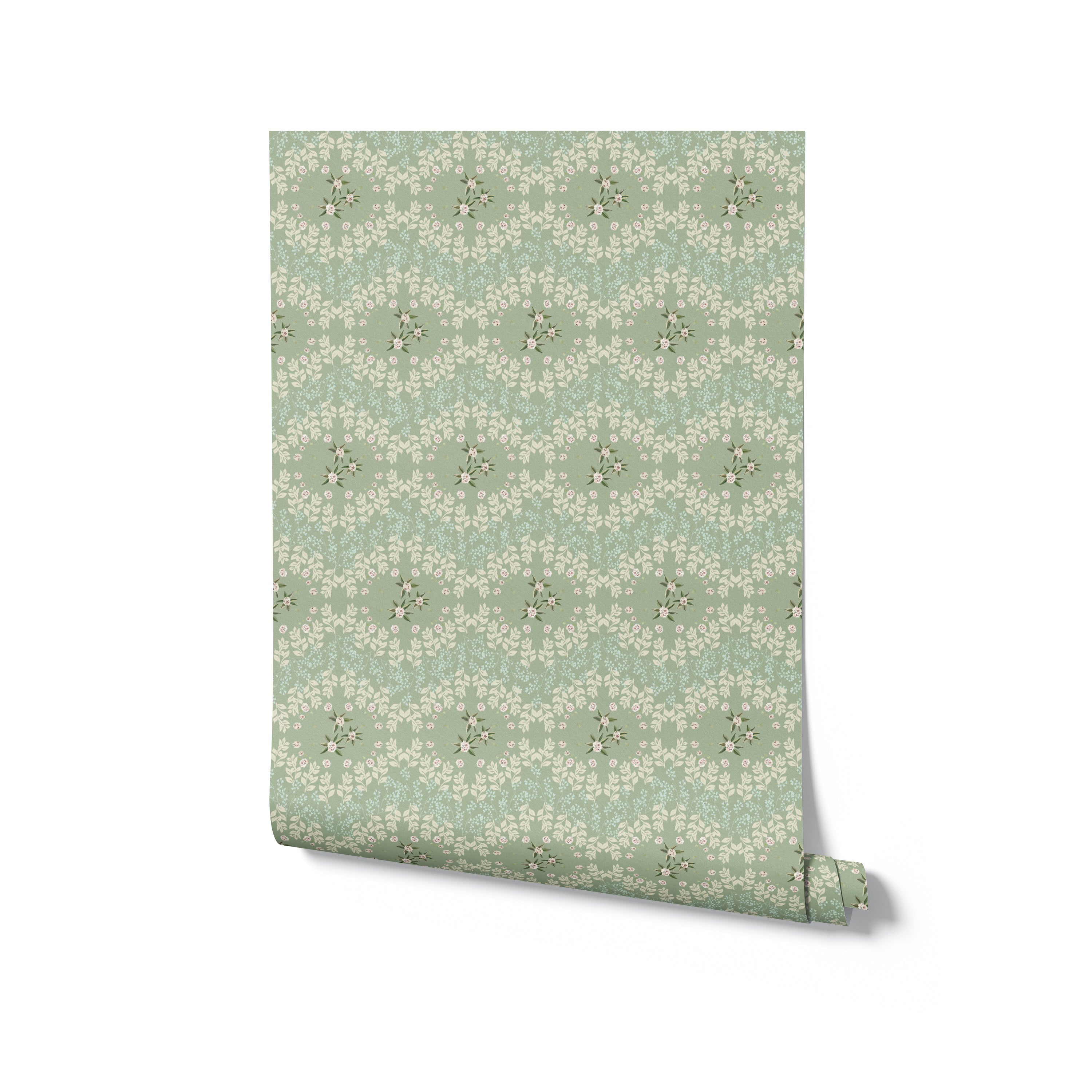 A roll of Heritage Blooms Wallpaper, displaying a beautiful floral pattern in soft green with white and pink accents. This elegant wallpaper brings a timeless and classic feel to any room, ideal for creating a warm and inviting environment