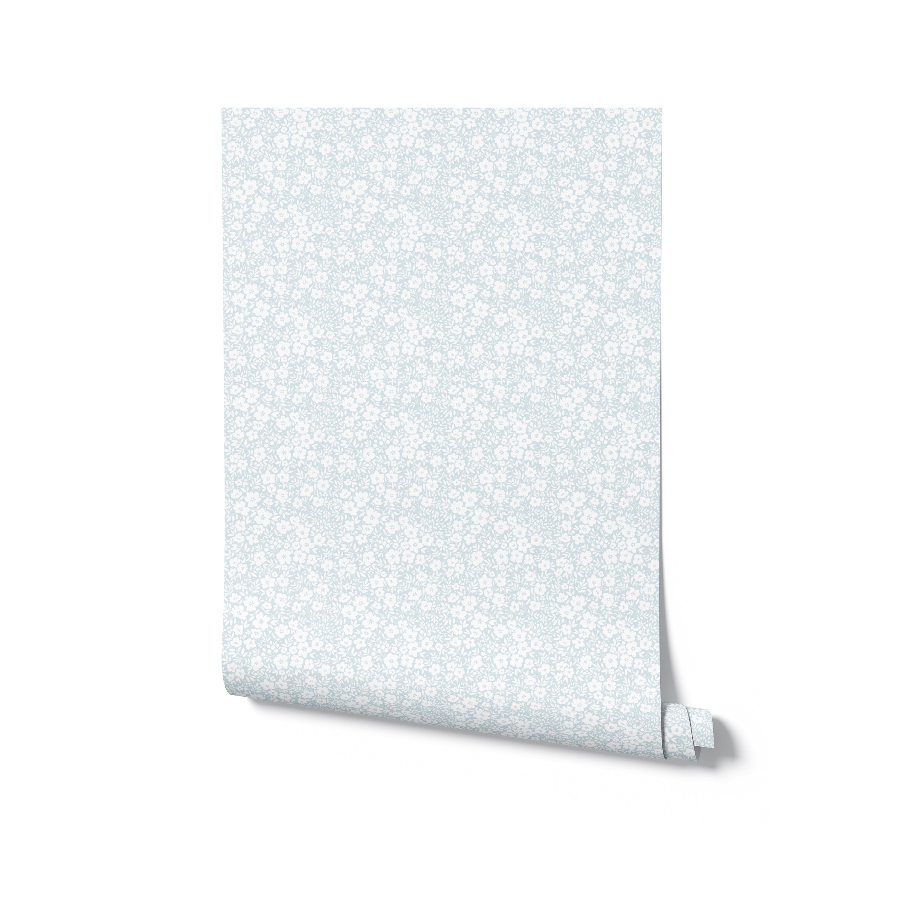 A wallpaper roll of 'Flower Power' design, showcasing a pale ice blue backdrop with a fine white flower print, standing vertically with the edge unrolling.
