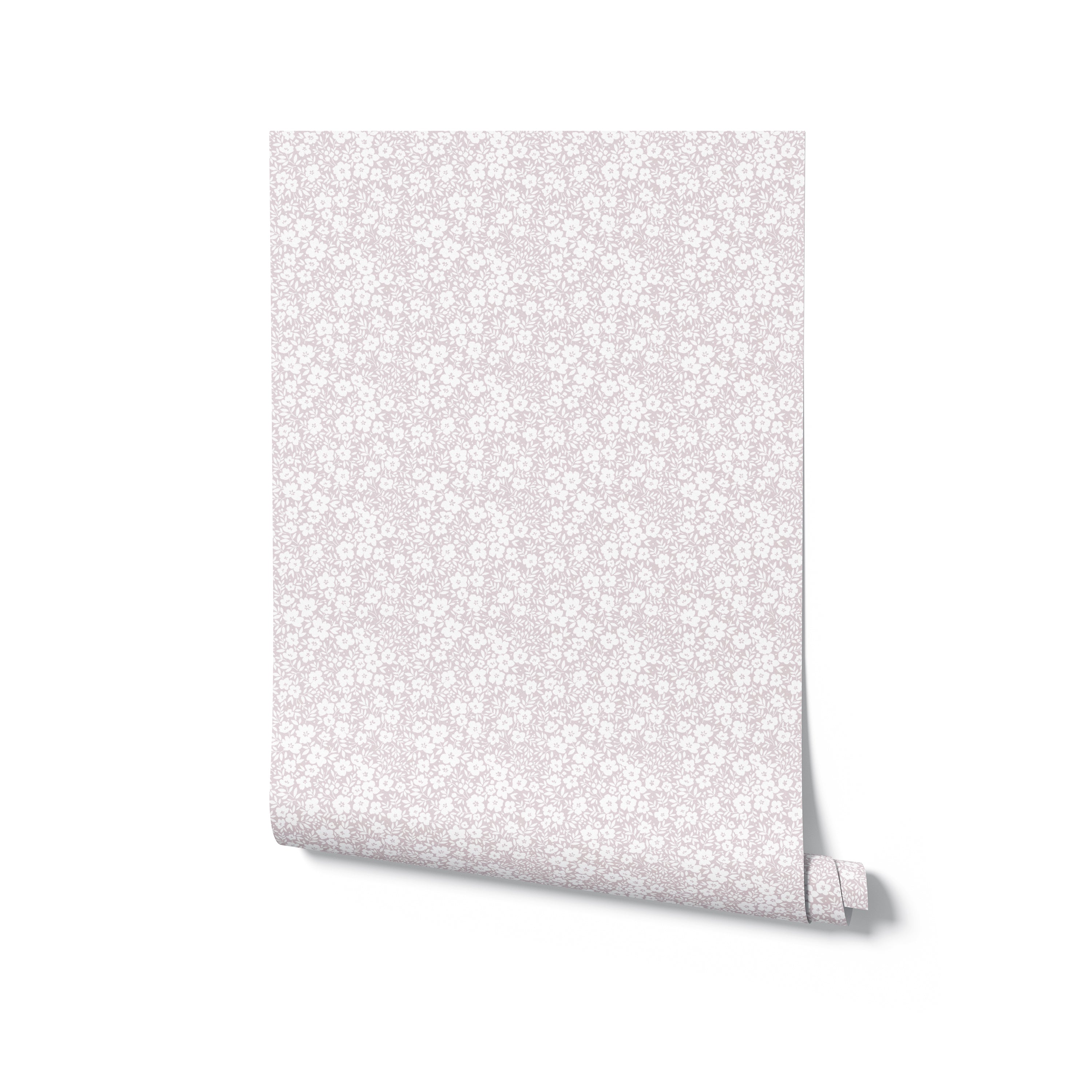 A roll of 'Flower Power' wallpaper featuring a mauve pink background with a small, delicate white floral pattern, displayed standing up with one edge slightly unrolled.