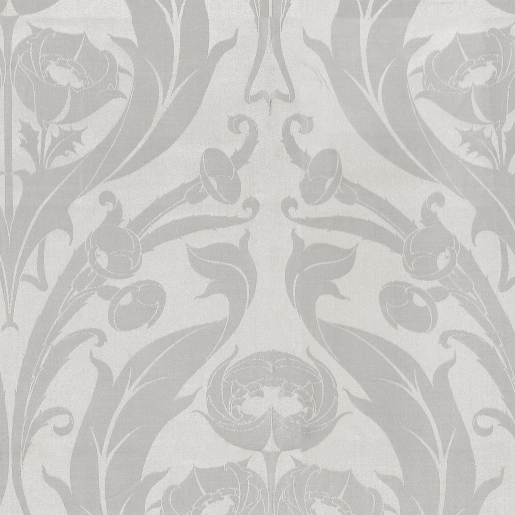 A close-up view of the Regal Elegance Wallpaper displaying its intricate floral pattern in shades of gray on a white background. The wallpaper features detailed flowers and ornamental leaves, providing a luxurious and refined look suitable for elegant interior settings.