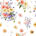 A close-up view of the Bouquet Bliss Wallpaper, displaying an exquisite array of watercolor flowers in soft pinks, yellows, and blues, interspersed with green foliage. This pattern captures the essence of a spring meadow, bringing a lively and natural feel to any interior.