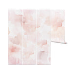 A detailed view of the Hand Painted Mural Wallpaper, showcasing its unique abstract watercolor strokes in shades of pink and cream, creating a dreamy and organic feel, perfect for a statement wall in any contemporary home.