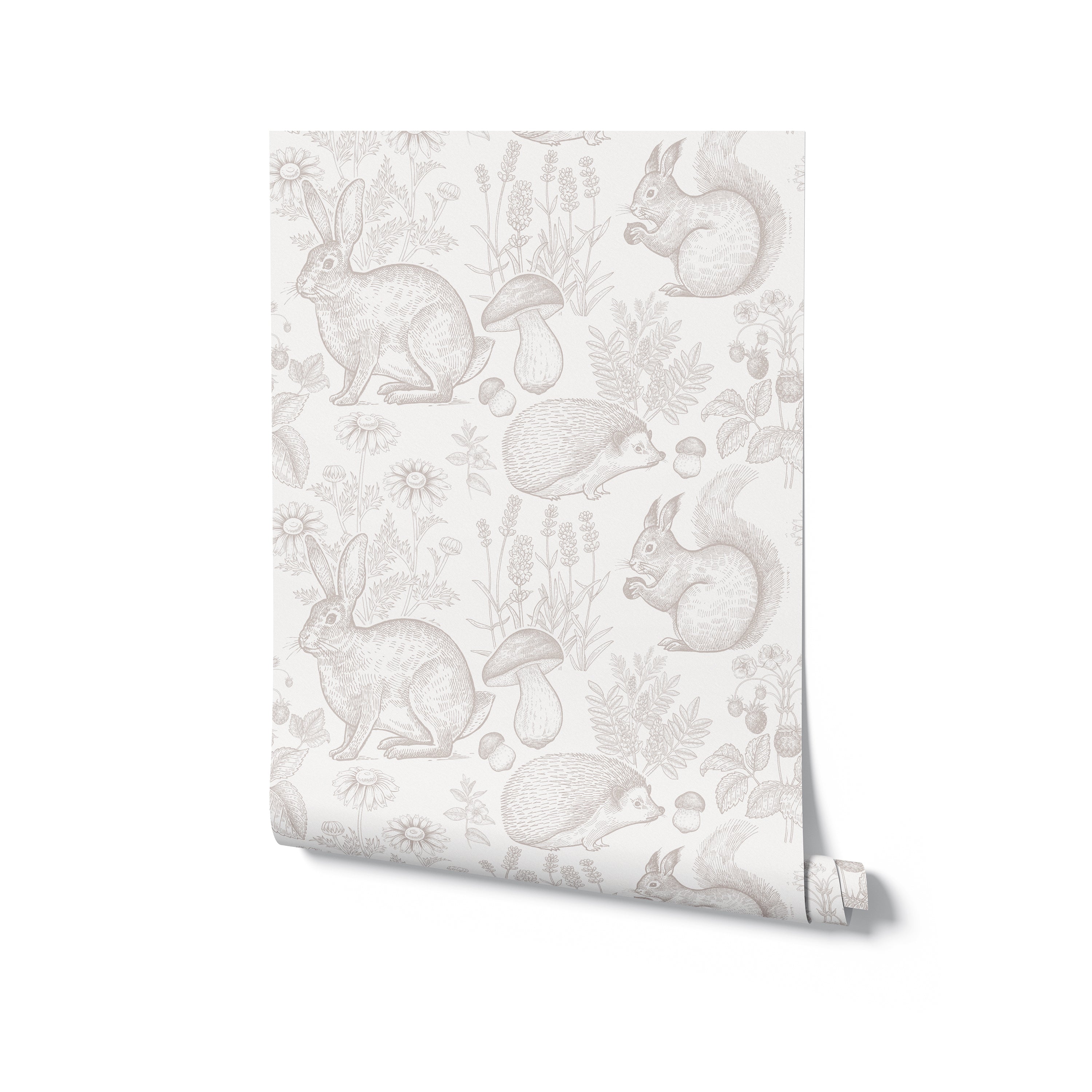 A whimsical roll of the "Woodland Creatures Wallpaper - Beige" is partially unrolled, highlighting the repeating pattern of forest fauna and flora. The neutral beige tones of the wallpaper offer versatility, making it suitable for a variety of room decors.
