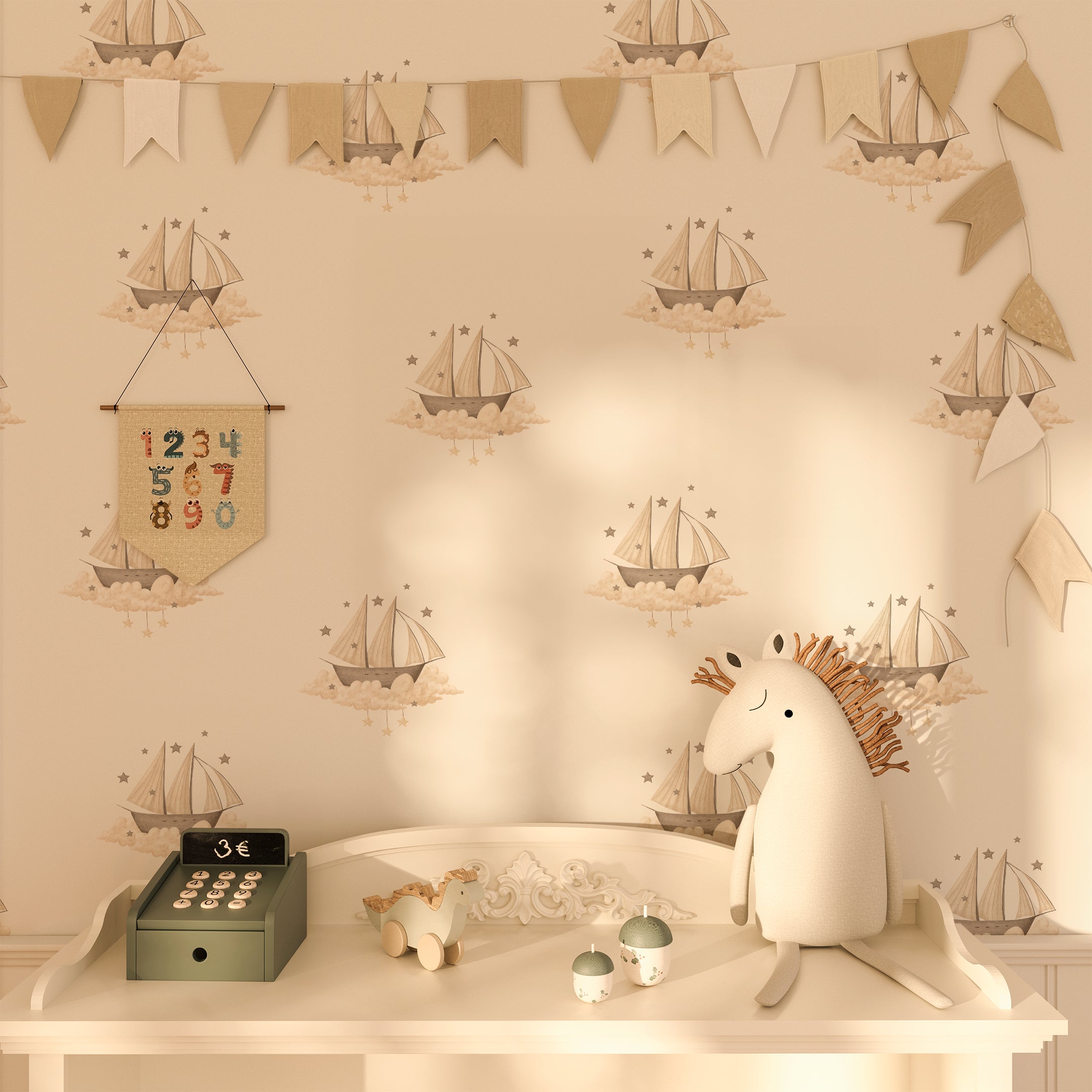 A playful room with Dreamy Sailboats Wallpaper, decorated with soft toys and nautical accents. The sailboat pattern enhances the room's dreamy atmosphere.