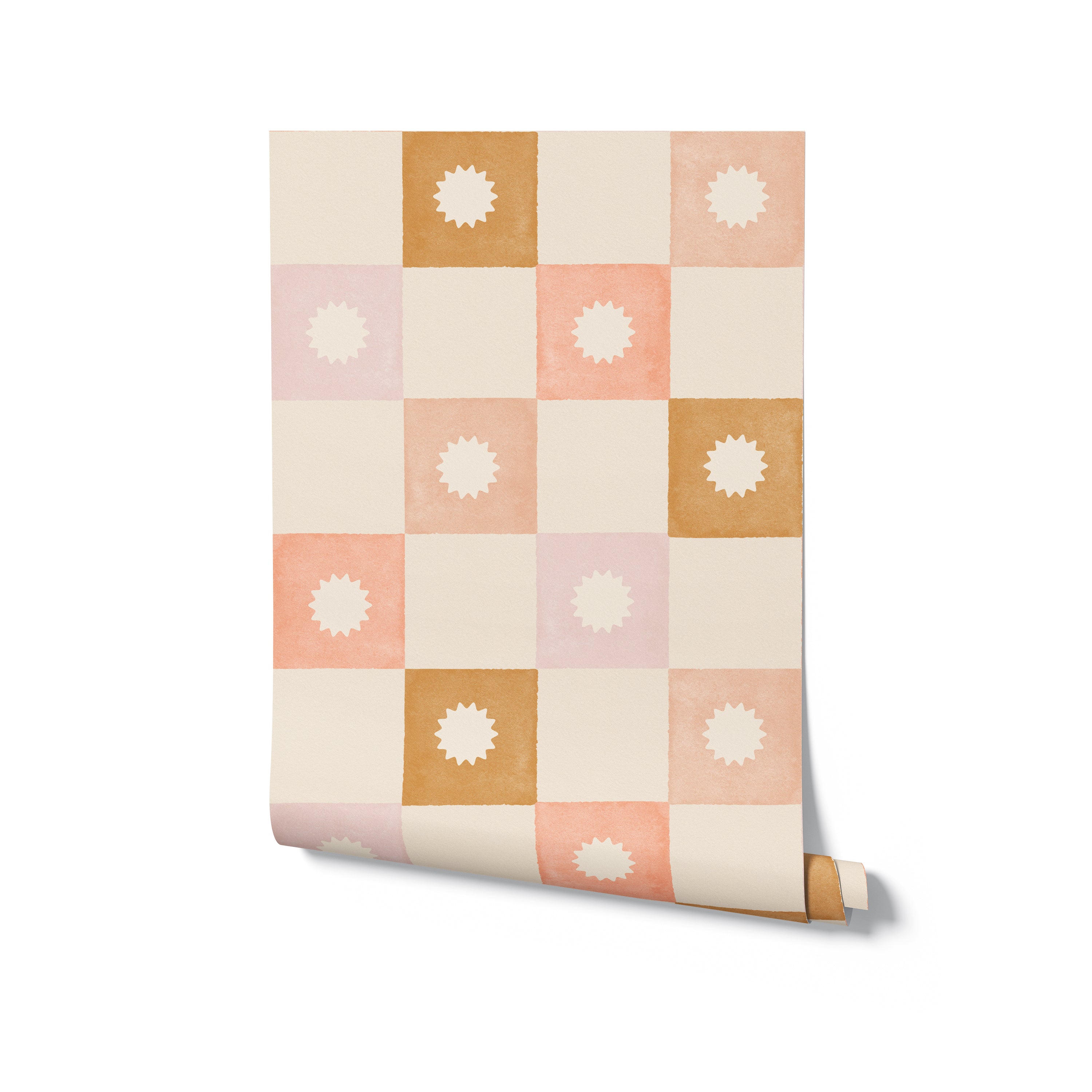 A roll of Coralie Wallpaper revealing its charming pattern of pastel peach, beige, and gold squares with decorative centers, ideal for adding a soft, warm touch to any room’s decor.
