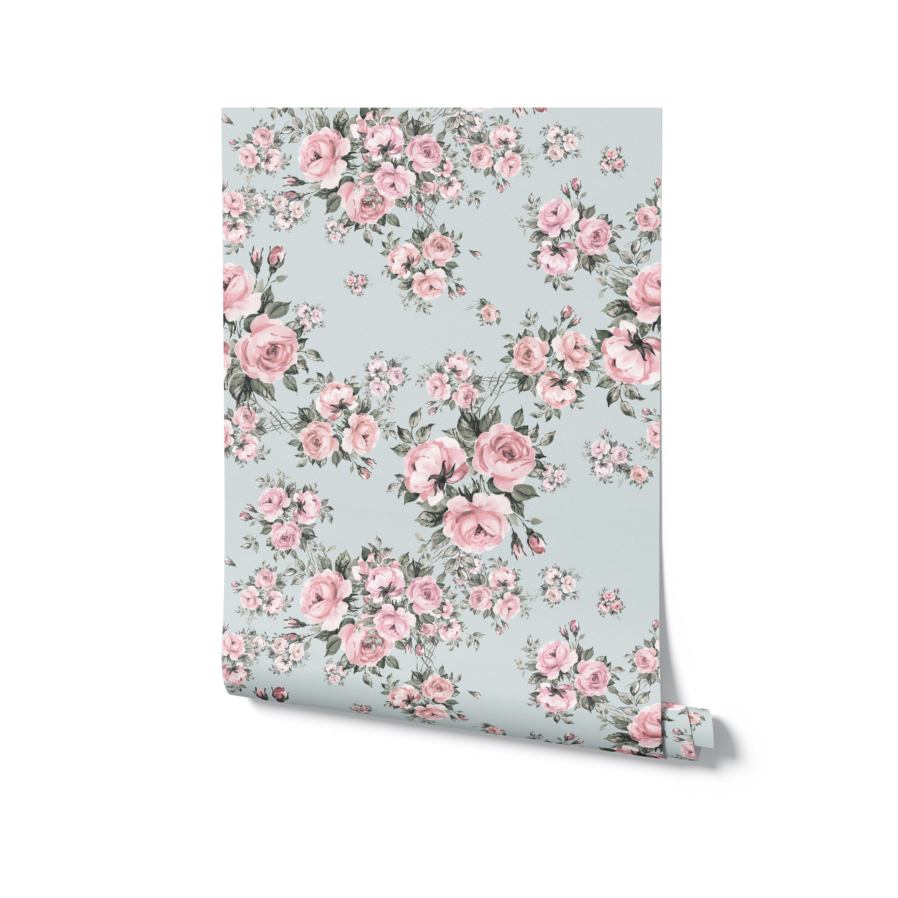 A roll of Rose Bouquet Wallpaper II displaying its beautiful pattern of pink roses and green leaves on a light blue background, ready to enhance any room with its floral elegance.