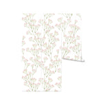 A roll of Le Marchand de Fleurs Wallpaper - 75", showcasing the wallpaper's gentle floral design with clusters of pale pink flowers and vibrant green stems, perfect for adding a touch of nature’s softness to any room.
