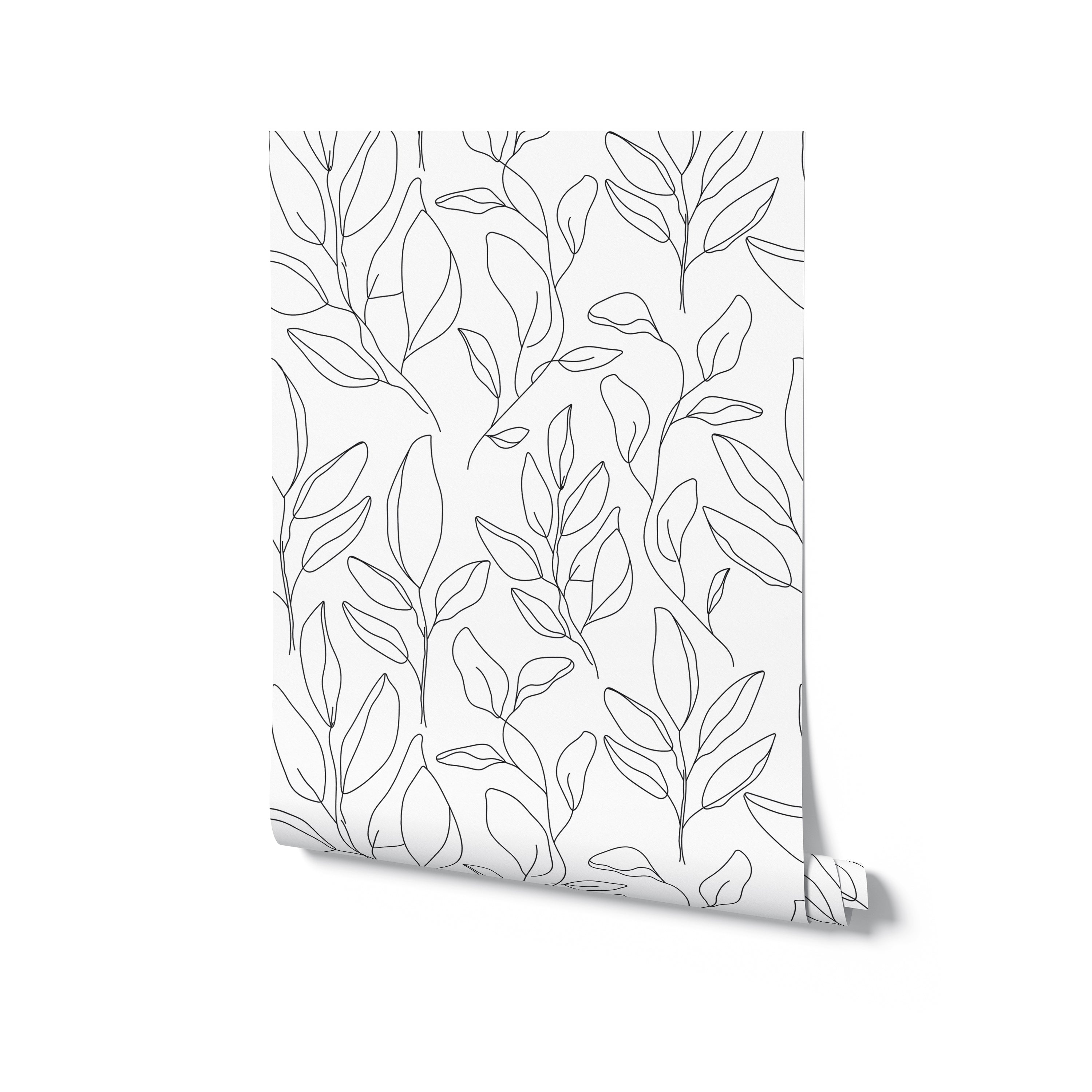 A mockup of a roll of Black Floral Wallpaper, showing the intricate black line art design of leaves on a crisp white background.