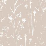 Detailed view of Subtle Meadow Floral Wallpaper, showcasing delicate white meadow flowers and slender stems on a warm beige backdrop