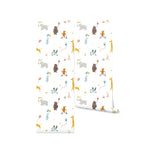 A roll of Adventure Wallpaper showing a detailed pattern of adventurous animals like giraffes, foxes, and elephants, all in playful scenarios, set against a white background with stars. This image highlights the wallpaper's vibrant and colorful design, perfect for a child's room or play area.