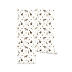 Rolled view of Deer and Bear Wallpaper, showcasing an endearing pattern of deer and bears interspersed with forest motifs on a clean white background. This design is ideal for nurseries or children’s rooms, bringing a fun and adventurous spirit to the space