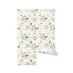 Rolled view of Forest Moth Wallpaper, displaying an intricate pattern of moths, green foliage, and small yellow flowers on a white background. This wallpaper is perfect for bringing a touch of nature’s tranquility to any interior space.