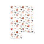 Rolls of Cute Cars Wallpaper 07 showing a detailed pattern of animated cars, buses, and scooters in red, blue, and yellow, combined with playful text elements on a crisp white background, perfect for adding a whimsical touch to children's rooms or play areas