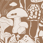 A roll of brown wallpaper with a playful mushroom print in cream, displaying a variety of forest fungi that add a touch of whimsy to any room decor