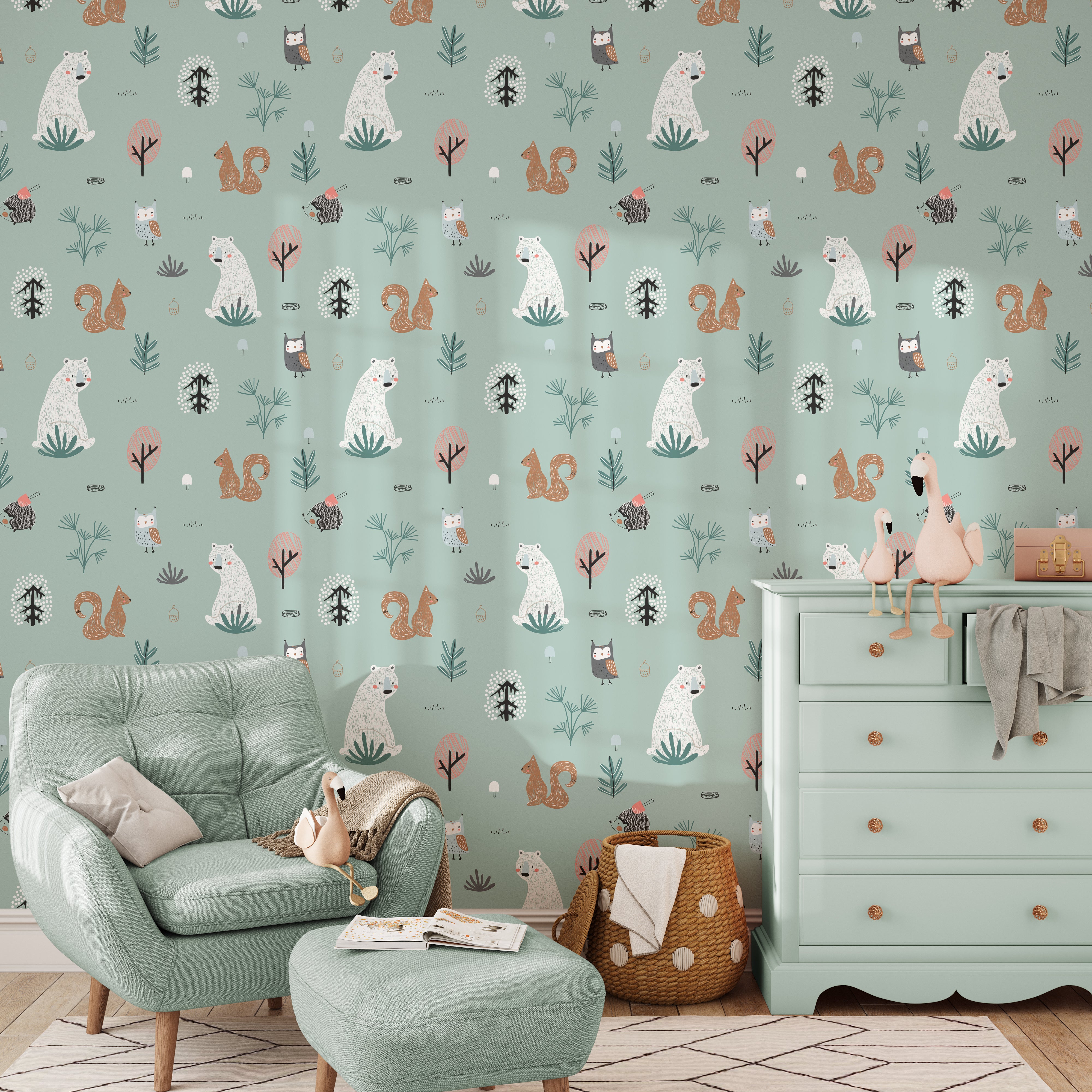 A cozy corner of a room features the "Kids Wallpaper - Forest Critters - 25 inches." The wallpaper, illustrating a serene forest scene with critters like bears and squirrels, complements the modern mint green armchair and minimalist decor, ideal for a reading nook or a child’s play area.