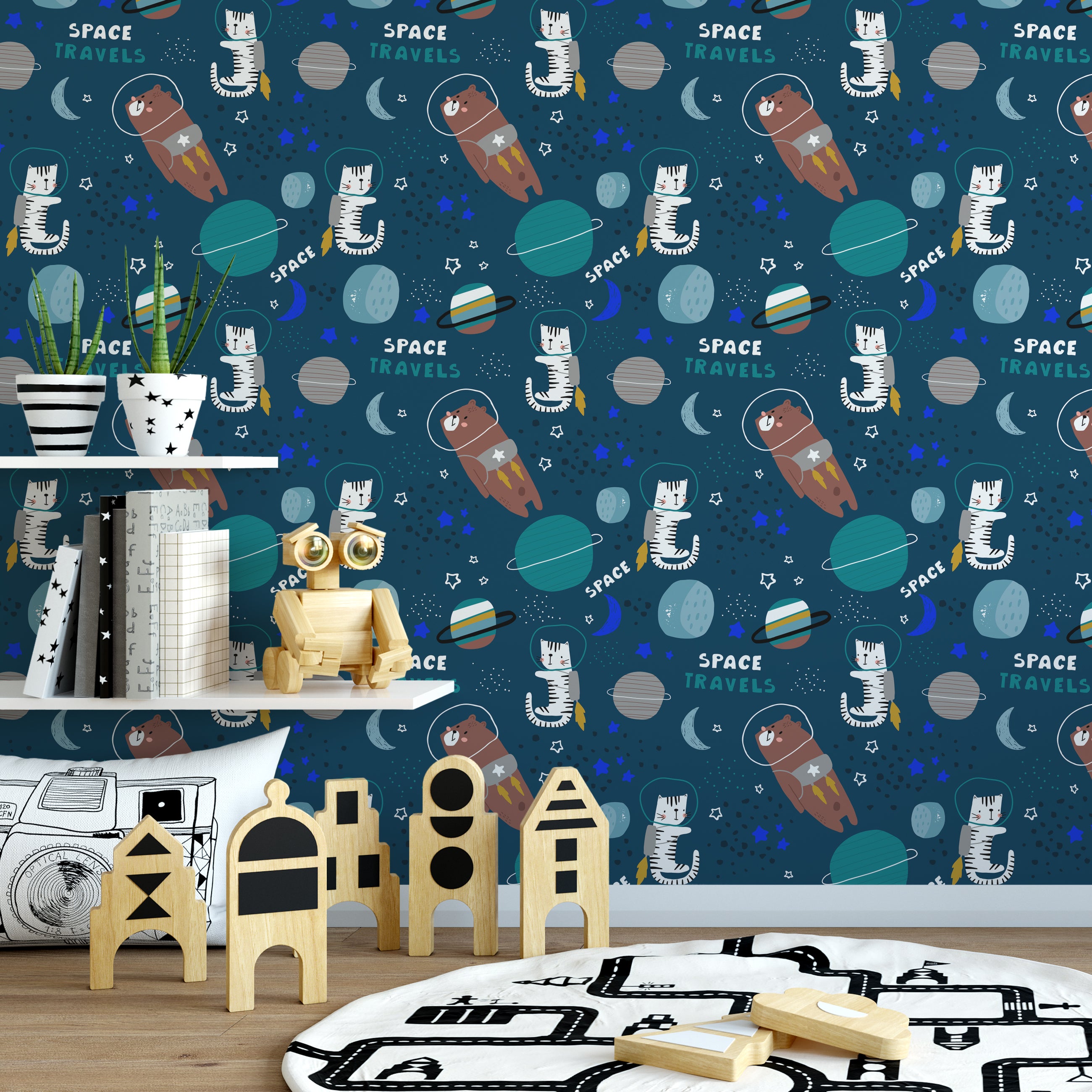 A vibrant children's room featuring a wall covered in a space-themed wallpaper with illustrations of bears and tigers wearing space helmets and jetpacks. The room is decorated with toys and shelves, creating a fun and imaginative atmosphere.
