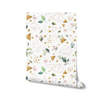 A roll of wallpaper with a floral and geometric design, displaying watercolor botanical elements alongside gold foil triangles and outlined geometric figures, all set on a white background, suggesting an elegant and contemporary style for interior decoration