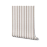 A roll of Striped Fabric Wallpaper presented against a white background, showcasing the gentle tan and cream stripes that offer a sophisticated fabric-like texture, perfect for creating a statement wall or a complete room makeover,  beige