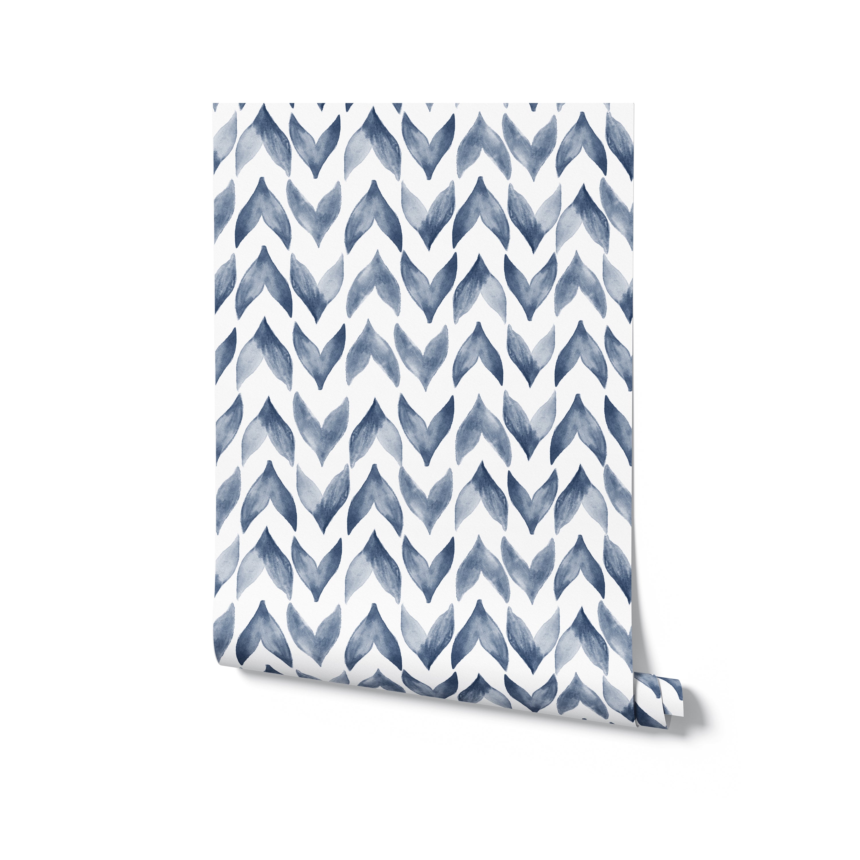 A rolled-up wallpaper sample revealing the Moroccan Tile pattern, which consists of white and navy watercolor zigzag shapes, giving a sophisticated and contemporary feel to the design.