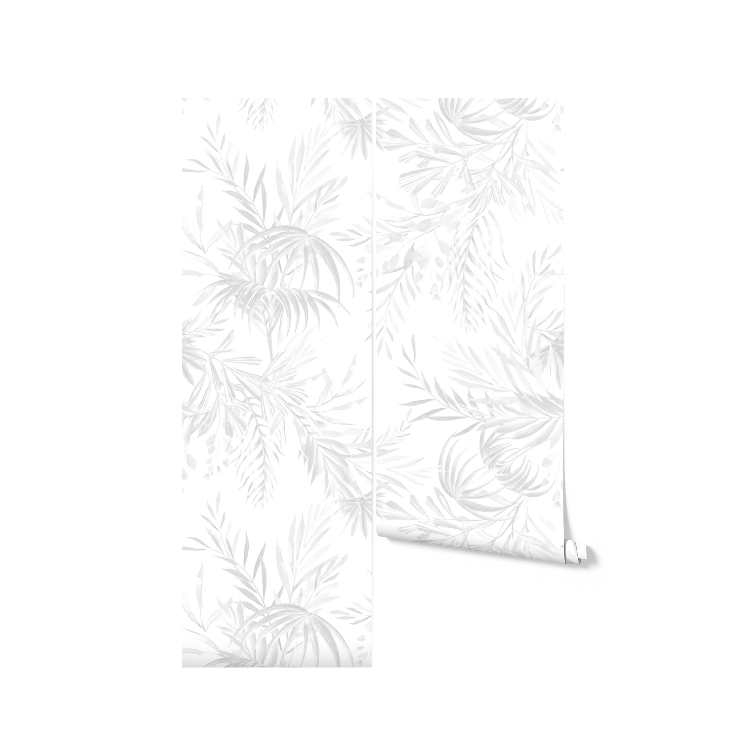 A single roll of Palm Springs Wallpaper features watercolor palm leaves in soft grey tones, suggesting a tranquil and chic aesthetic for walls in residential or commercial spaces. The roll gives a glimpse of the continuous tropical pattern that exudes a relaxing vibe.