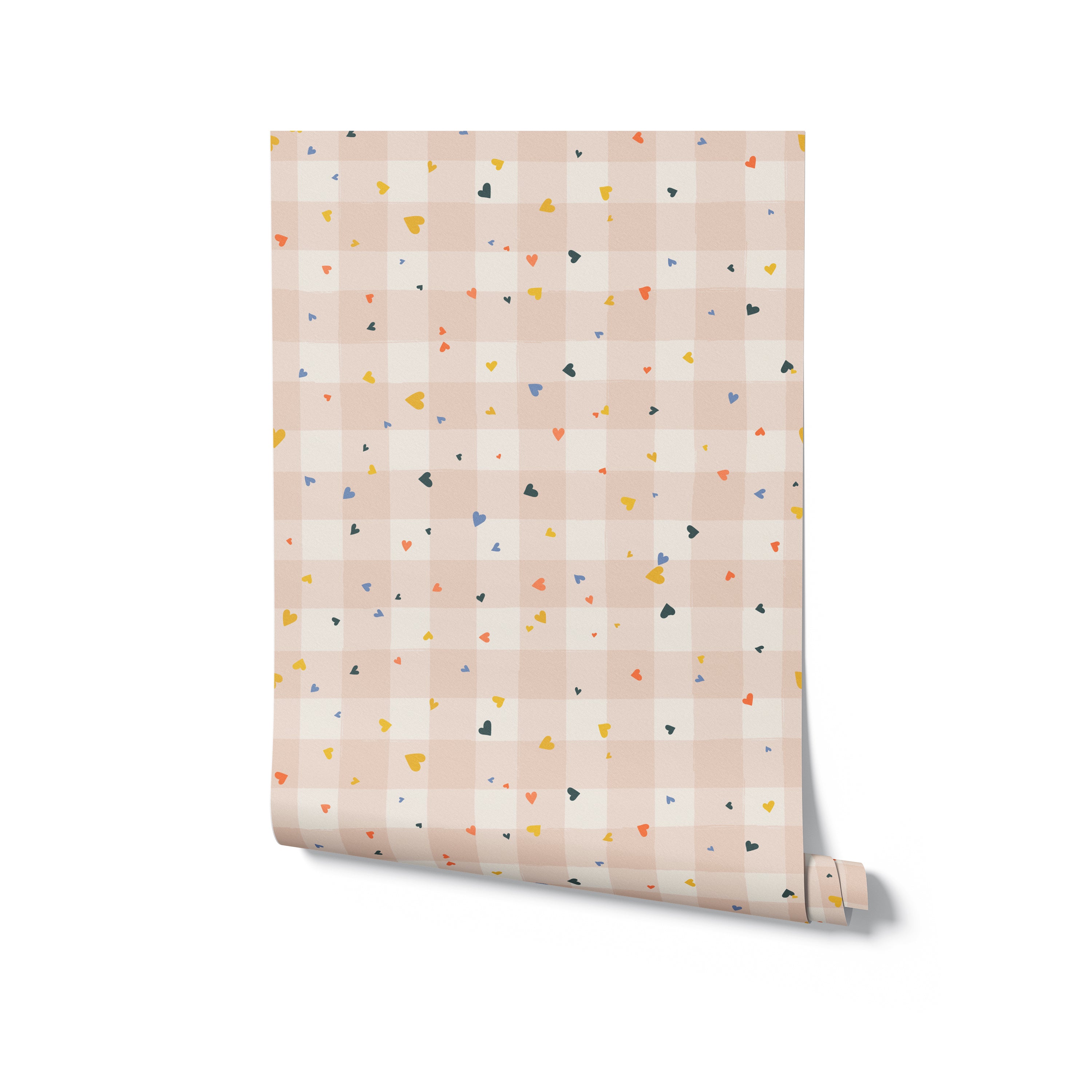 A rolled wallpaper with a playful geometric pattern of tiny triangles in yellow, orange, navy blue, and black on a soft pink background.