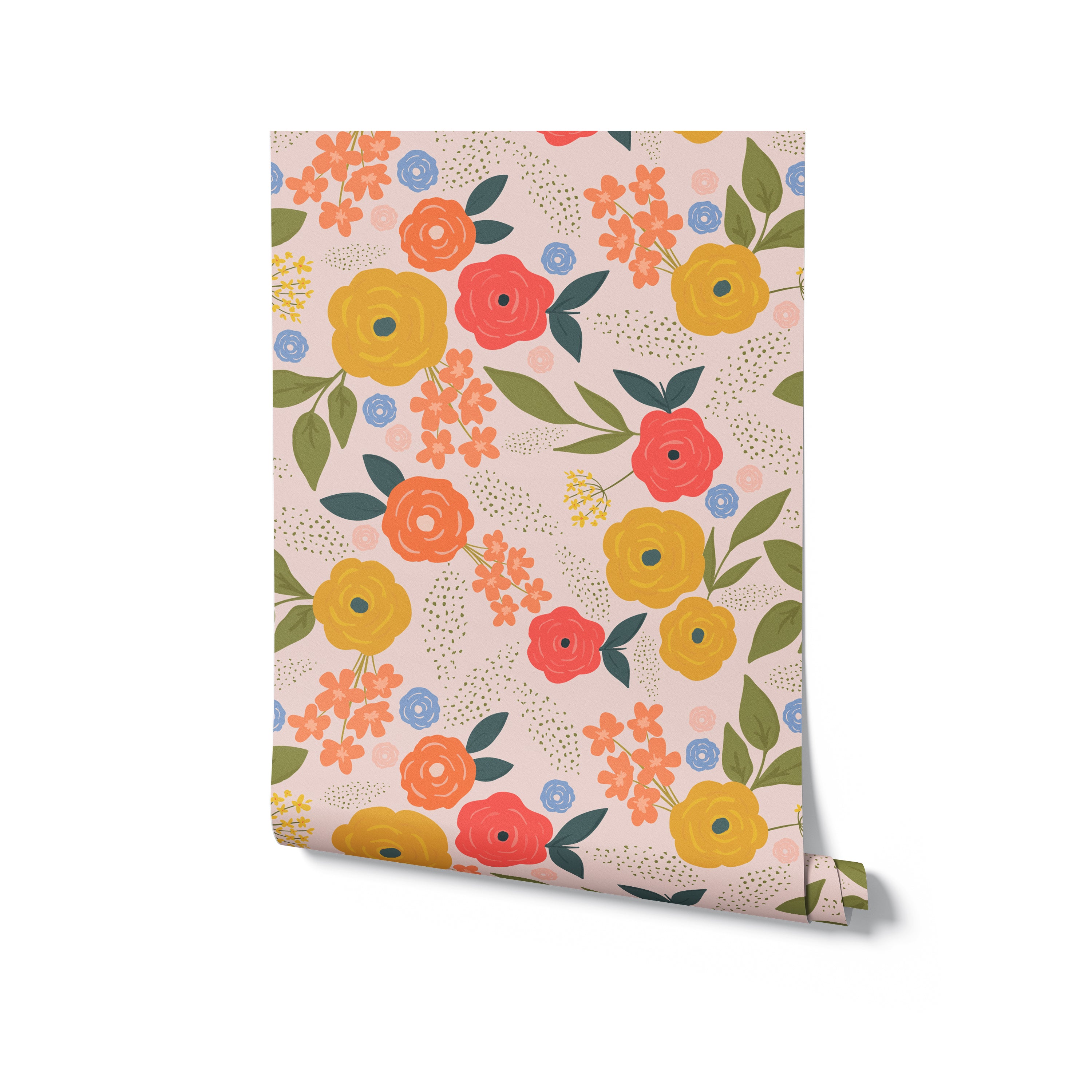 A roll of wallpaper with a floral pattern of yellow, orange, and red roses, small blue flowers, and green leaves on a soft pink background