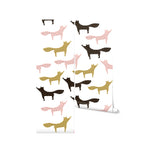 Roll of 'Foxes Wallpaper' displaying a fun and colorful pattern of pink, gold, and black foxes on a white backdrop, ideal for adding a playful touch to children's rooms.