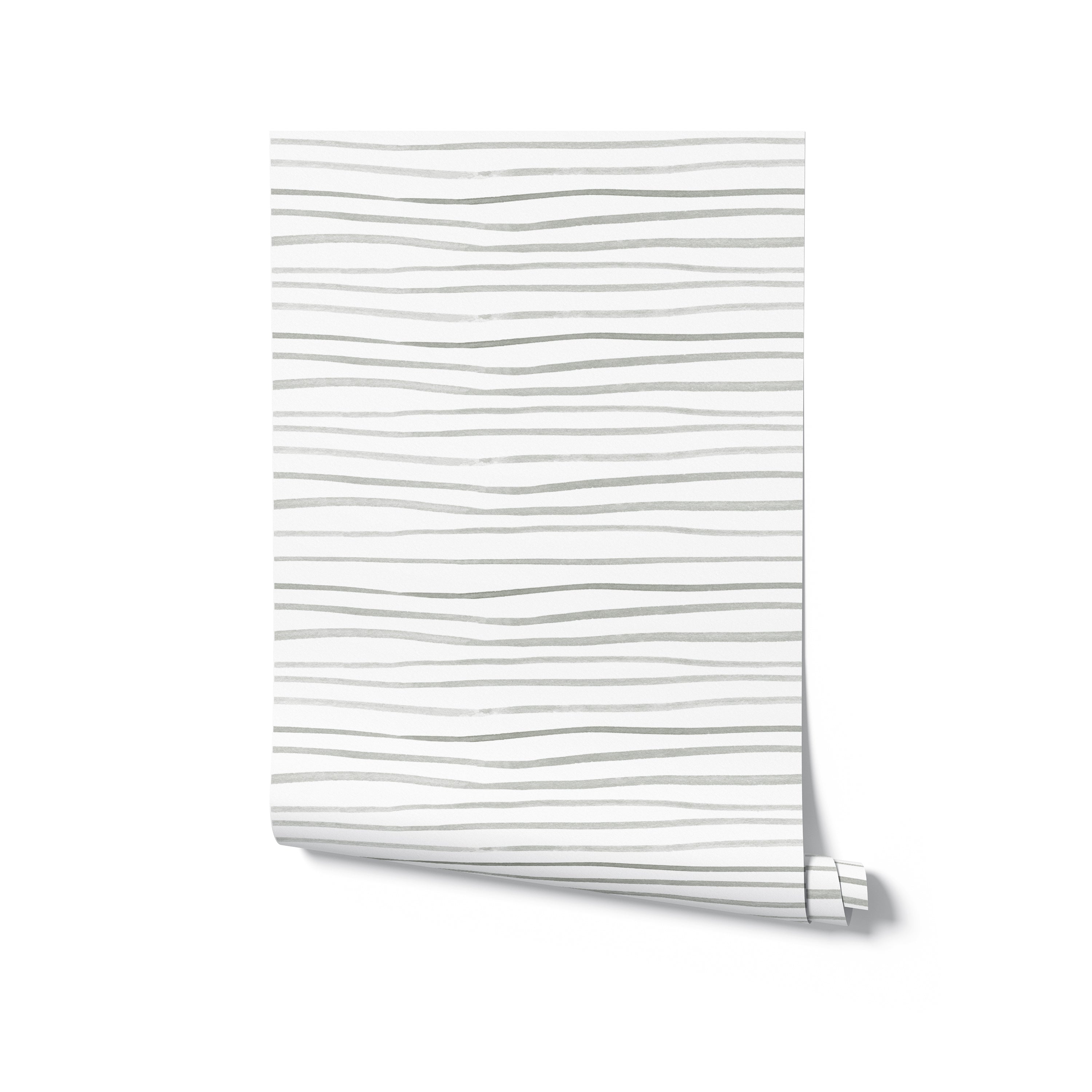 A roll of wallpaper showcasing minimalistic gray brush stroke lines on a white background, ideal for creating a modern and understated look in any space.