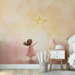 "Nursery wall adorned with 'My Guiding Star Mural' depicting a young girl touching a star in a whimsical setting."