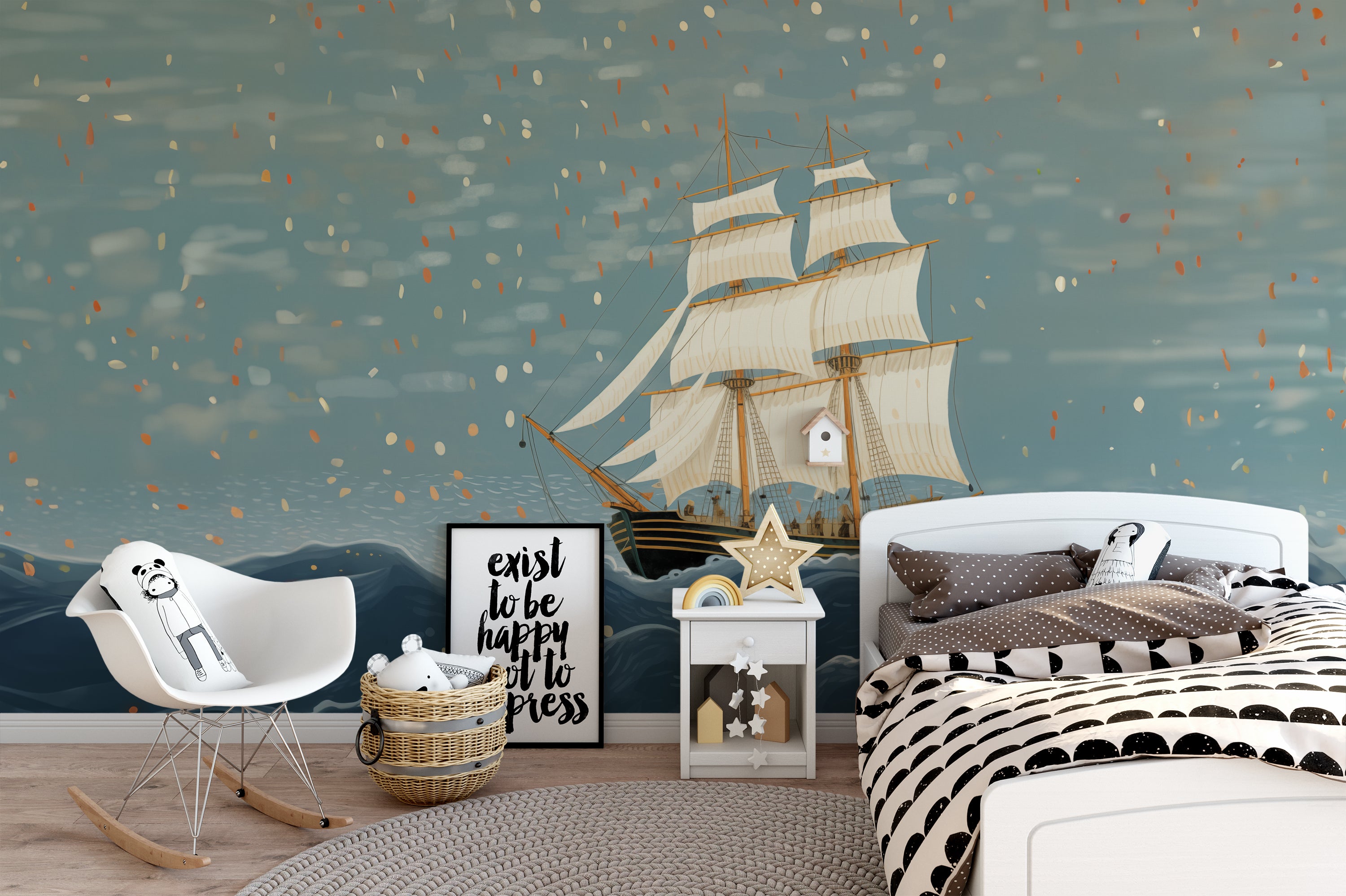 Playful child's room with ocean mural depicting a sailing ship, furnished with a small table and chairs and draped canopy bed.