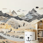 "Artistic Mountain Town Mural in Child's Playroom Featuring Wooden Toys and Neutral Decor"